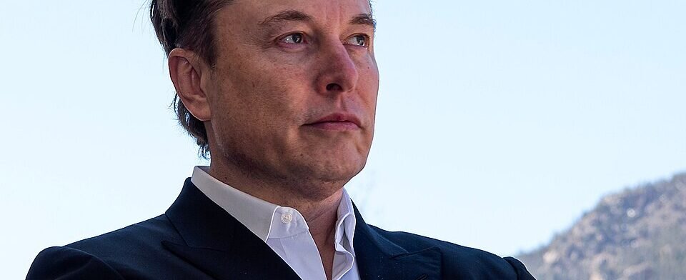 Starlink satellite dish and smartphone illustrating SpaceX's planned expansion into mobile wireless service