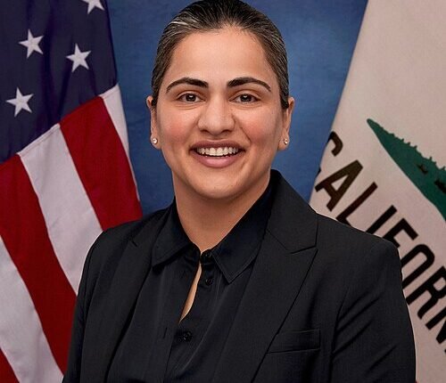 Aisha Wahab speaking to supporters at a California election event.