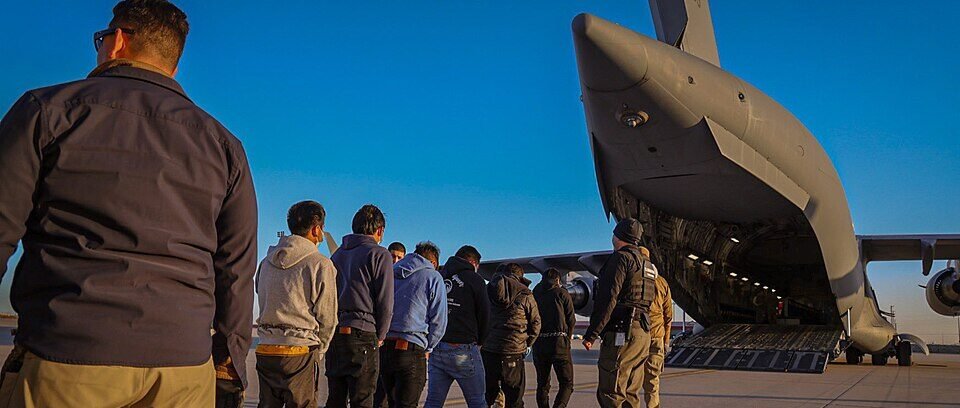 ICE charter aircraft prepared for a U.S. immigration removal operation.