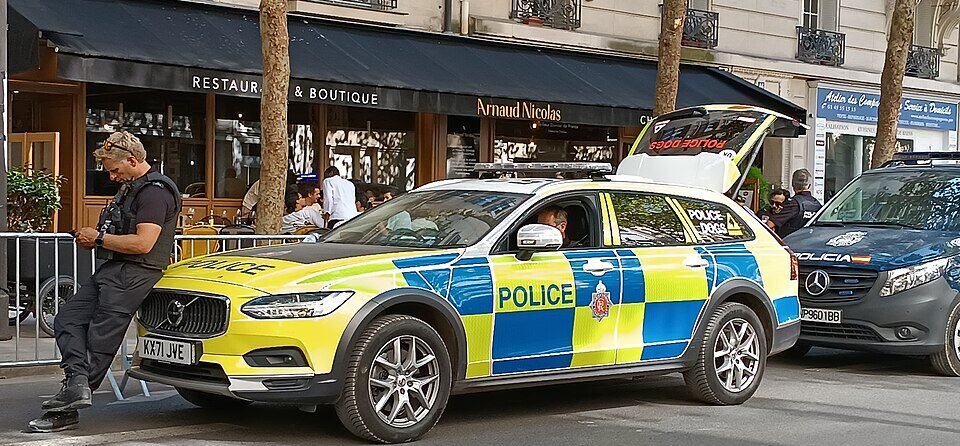 British police and explosive ordnance disposal units attending a major incident scene near a military base