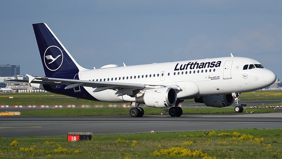Lufthansa Airbus A340-600 aircraft showcasing its uniquely stretched fuselage on the airport tarmac before retirement.
