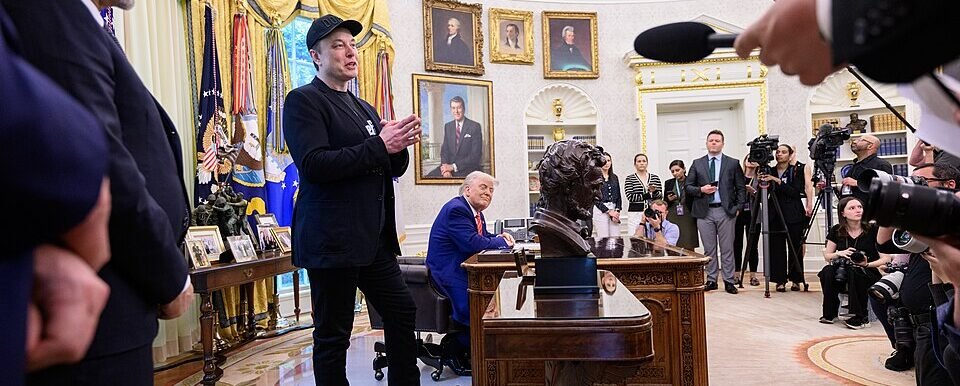 Elon Musk speaking at a political event during the 2024 U.S. presidential election campaign.